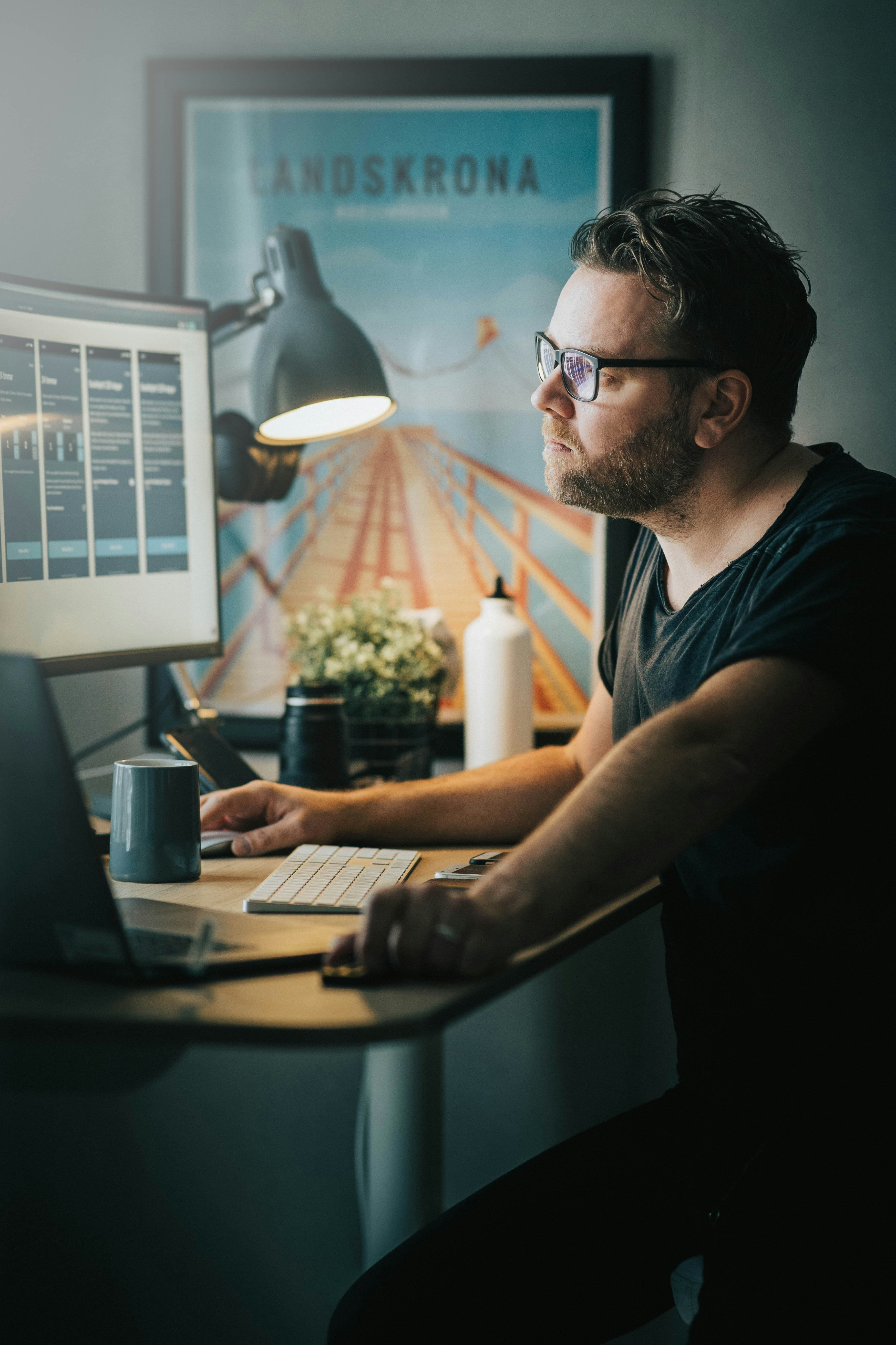 A web designer checking a website on his computer